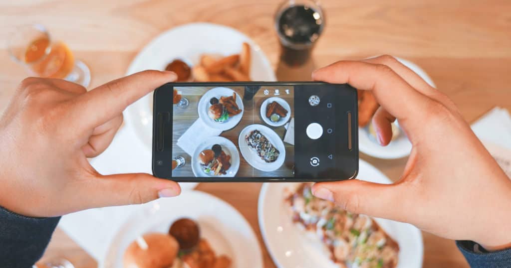 Food through the screen of a phone