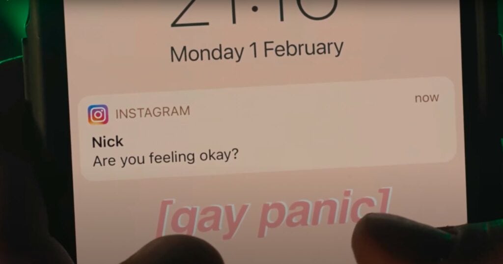 Screenshot from the Heartstopper Netflix Series showing Charle's phone wallpaper that reads: 