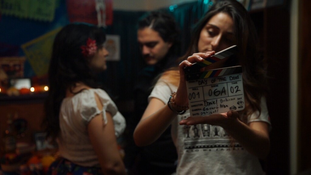 Filmmaking process of 'Día de Muertos' Dir by Danny Bribiesca. On the picture from front to back, 2nd AC Maria de Sá, Actress Laura Gudiño and Actor Esteban de la Isla
